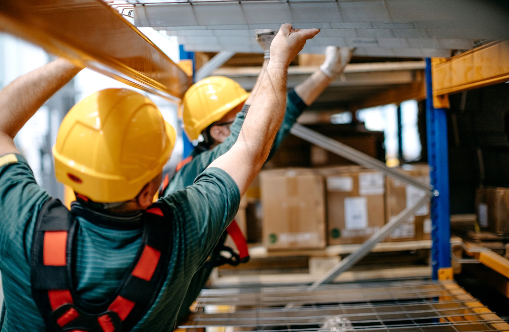 Construction of pallet racks in an industrial warehouse facility
