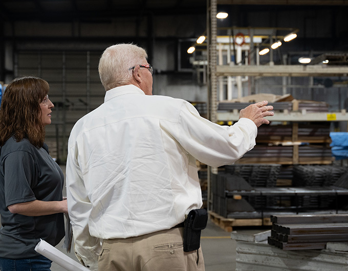 consulting team members in a warehouse